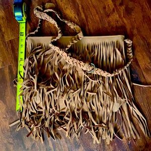 Large suede fringe bag with braided buckle strap